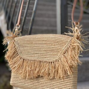 Handmade reed handbag with raffia bangs and long handle