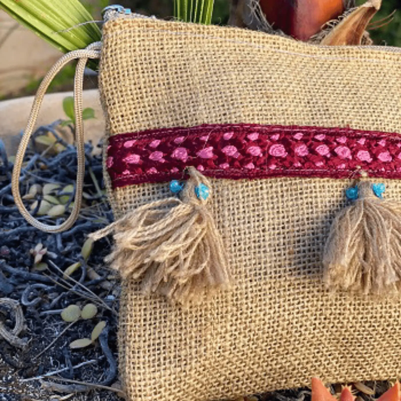 Sack pouch with pompoms and red ribbon decoration - Image 3