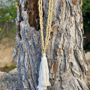 Mala pendant with wood and tassel decoration